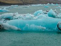 0009 Icebergs which have freshly turned over are blue, while older bergs weather to a dirty white